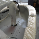 Spraying Boat Deck with Marine Coatings